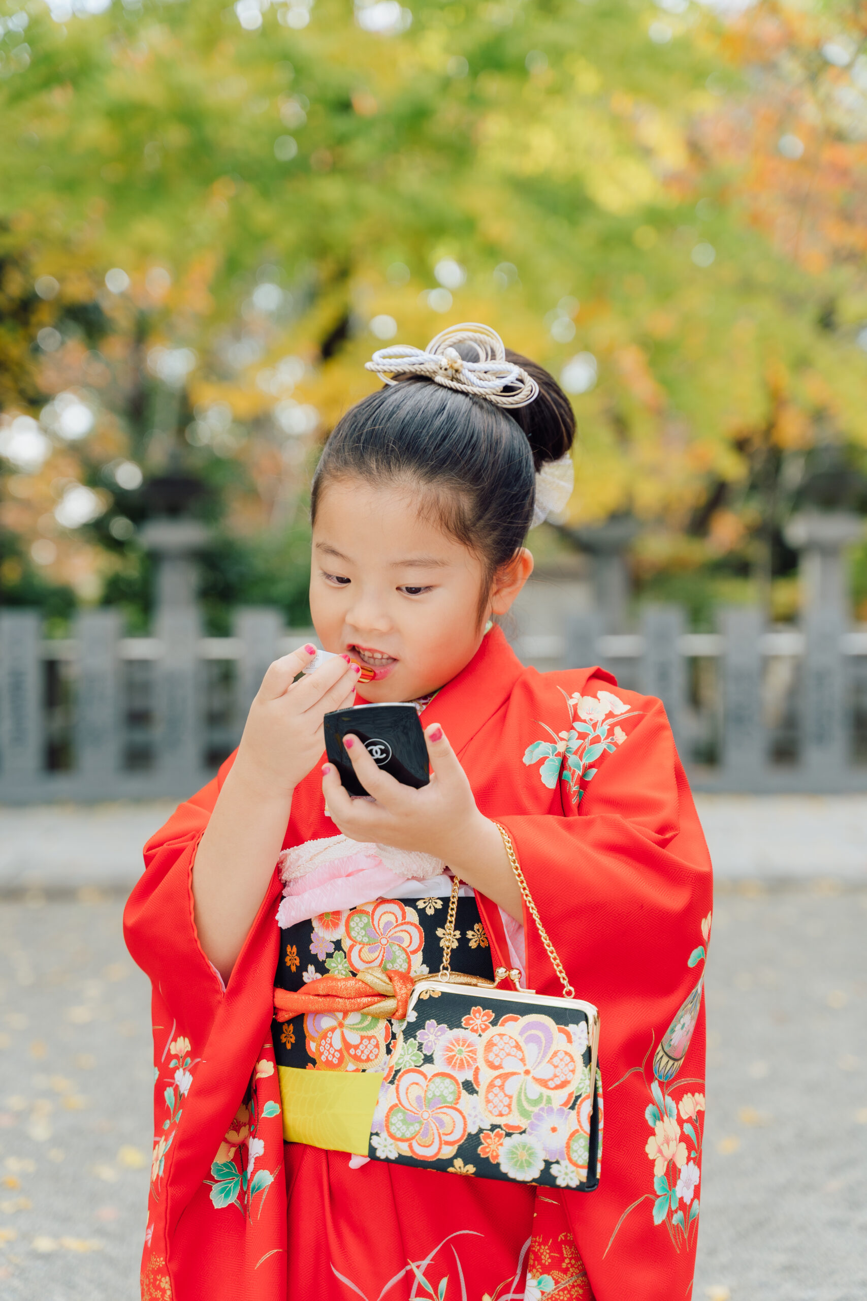 Kimono detail and lanterns — intimate frame