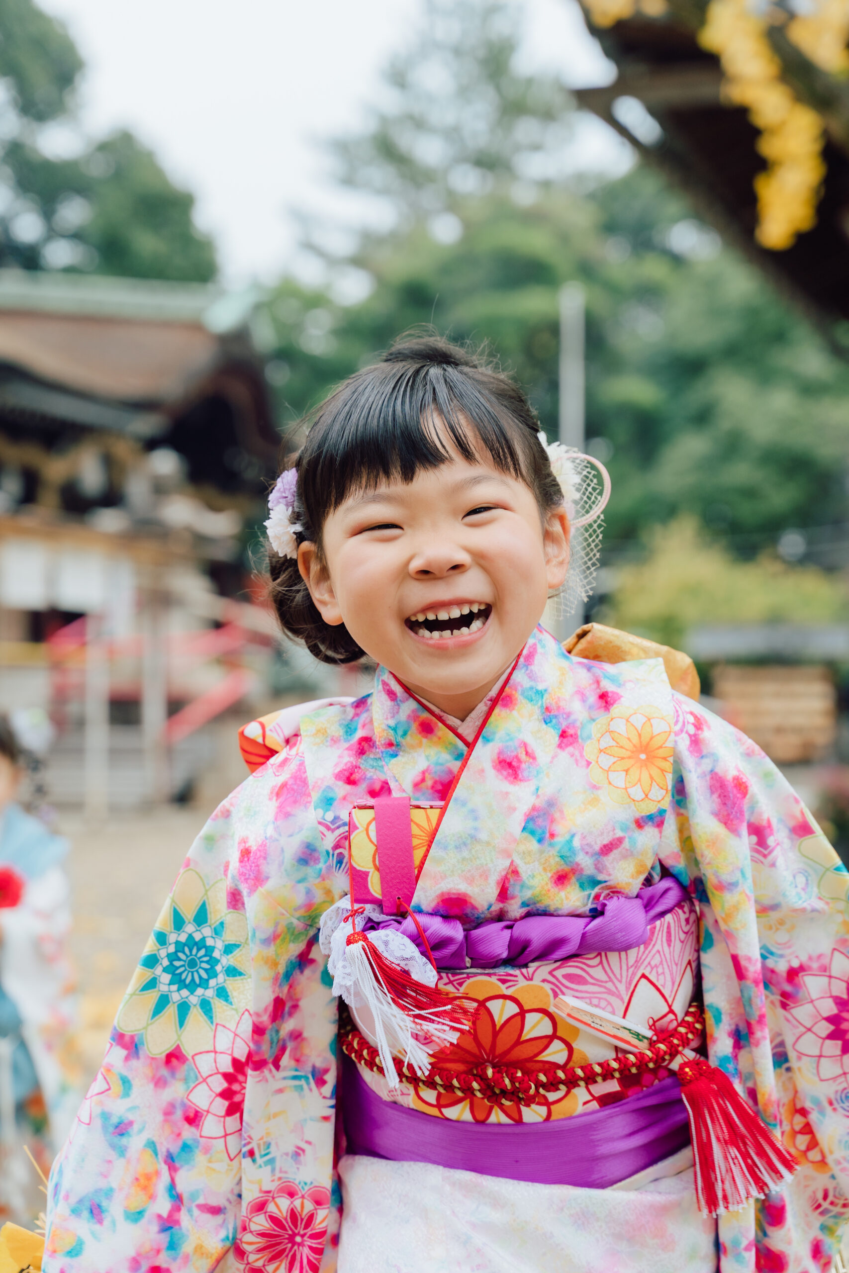 Kimono portrait — subtle expression near shrine