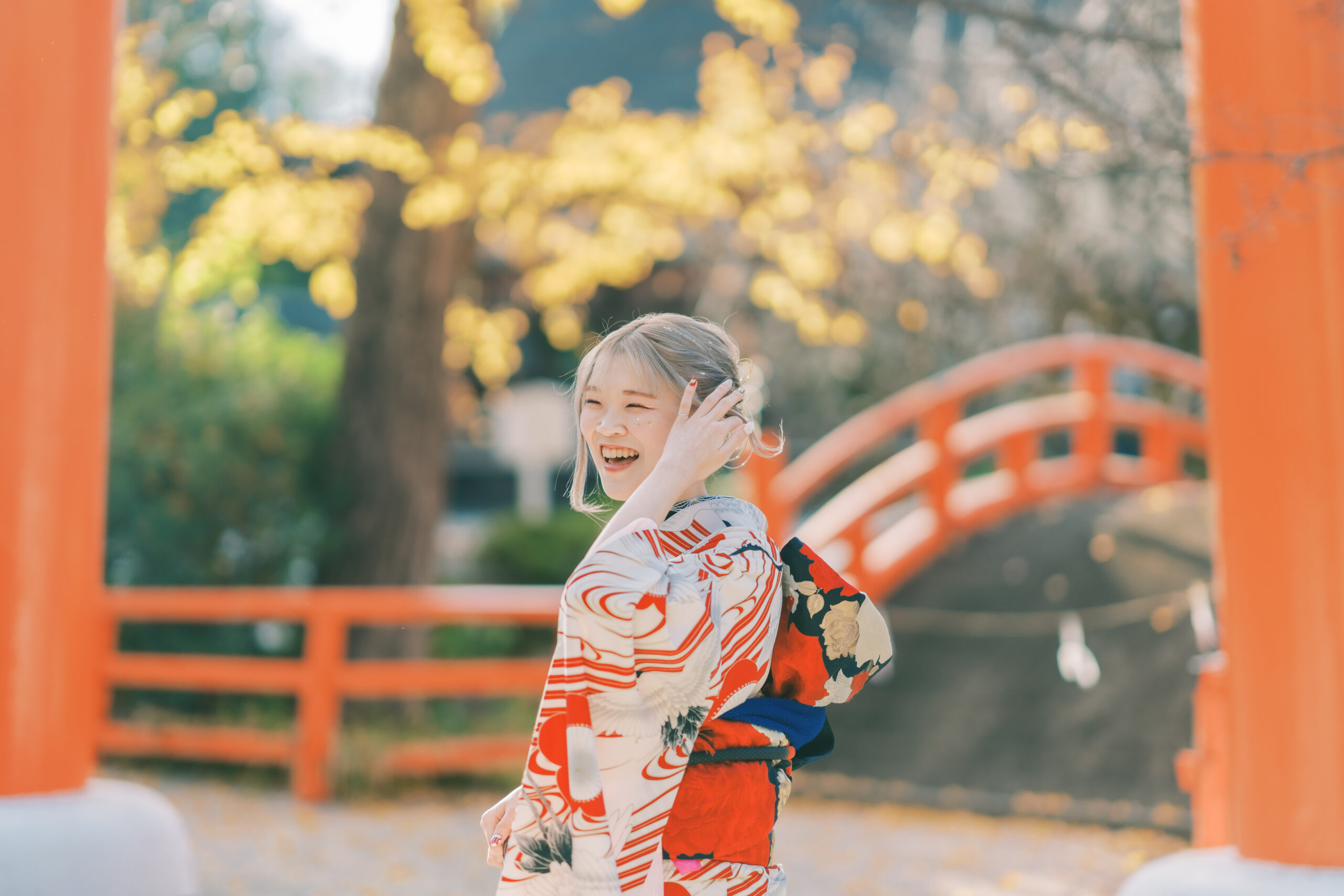 Family strolling under maple canopy, cozy autumn tone