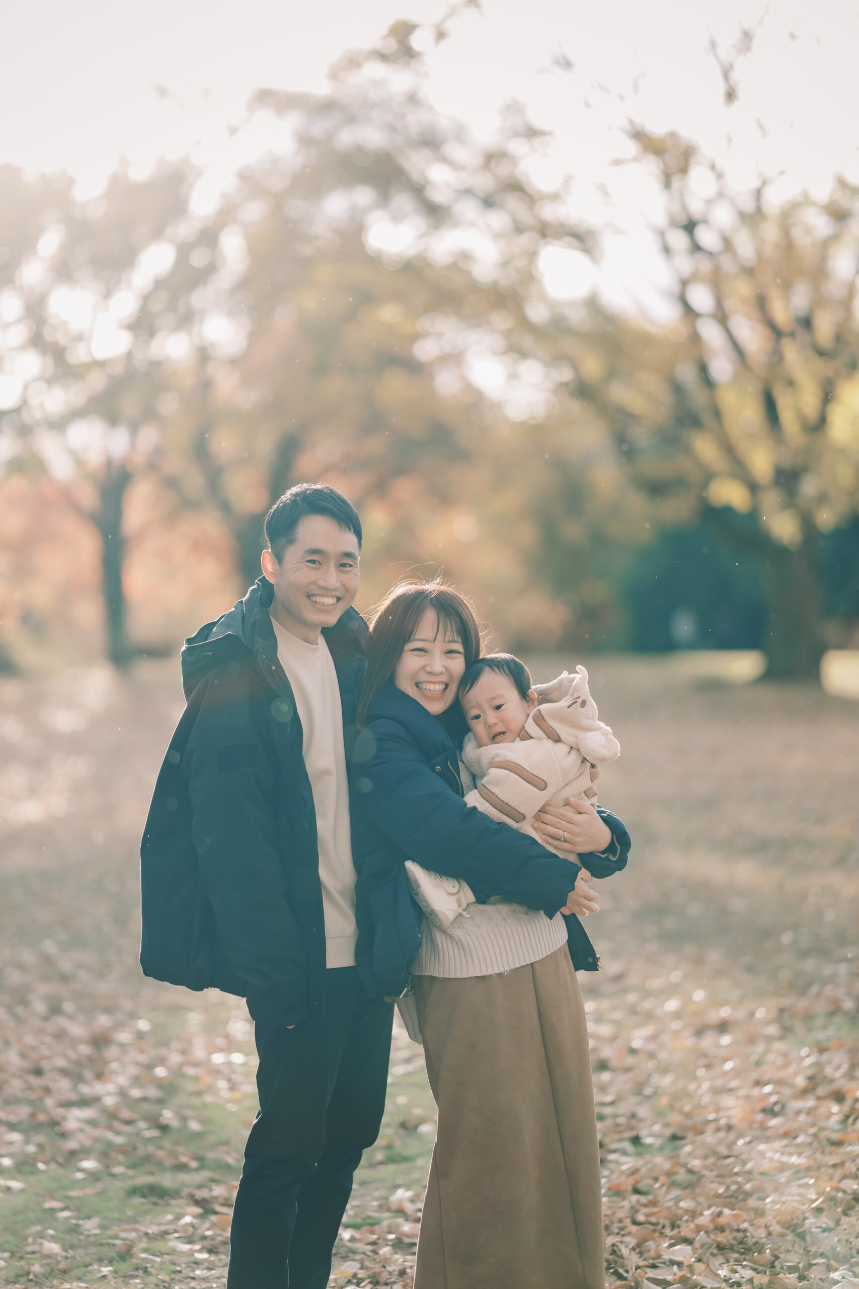 Couple at golden hour with autumn leaves, Kyoto