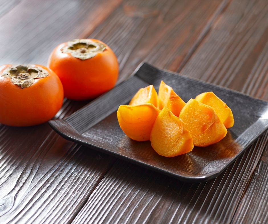 City canal lined with maple trees in peak color