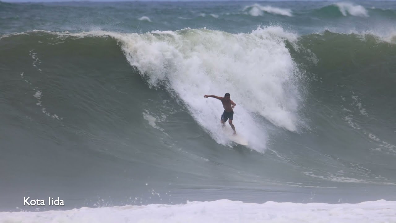 Wide beach with mellow waves